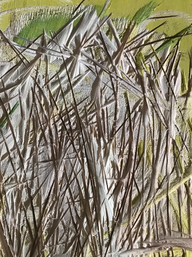 Ein Gemälde aus Schilfrohr auf gelbem Hintergrund.